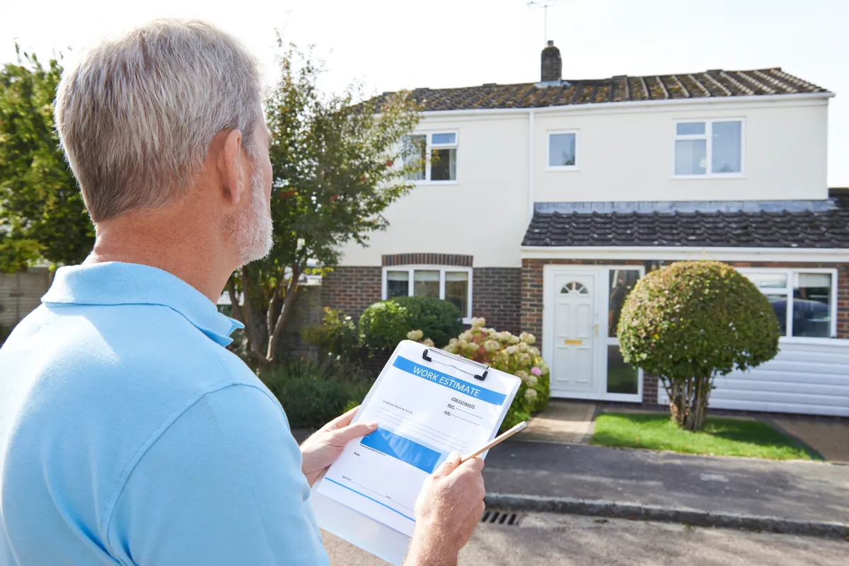 Contractor reviewing an estimate with a homeowner