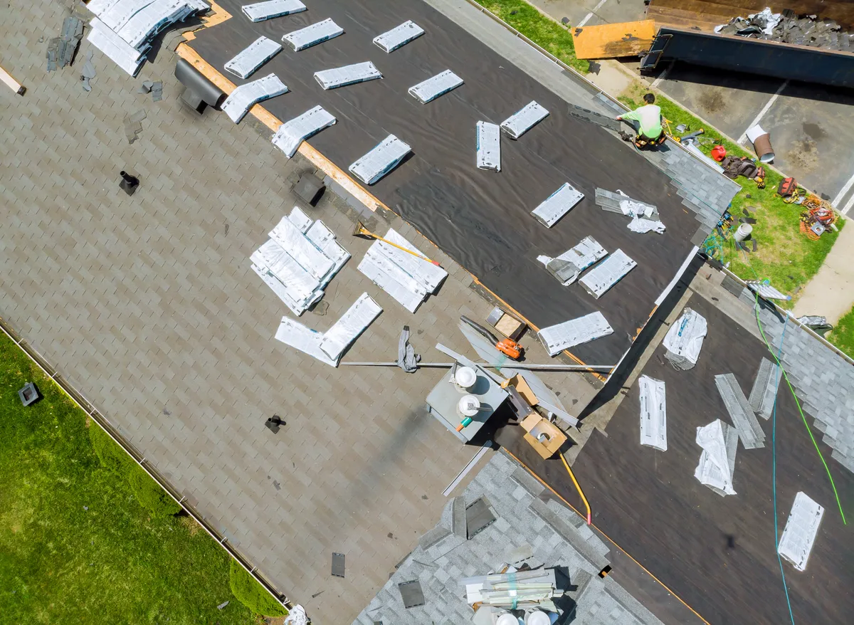 Shingle packages laid out during roof installation