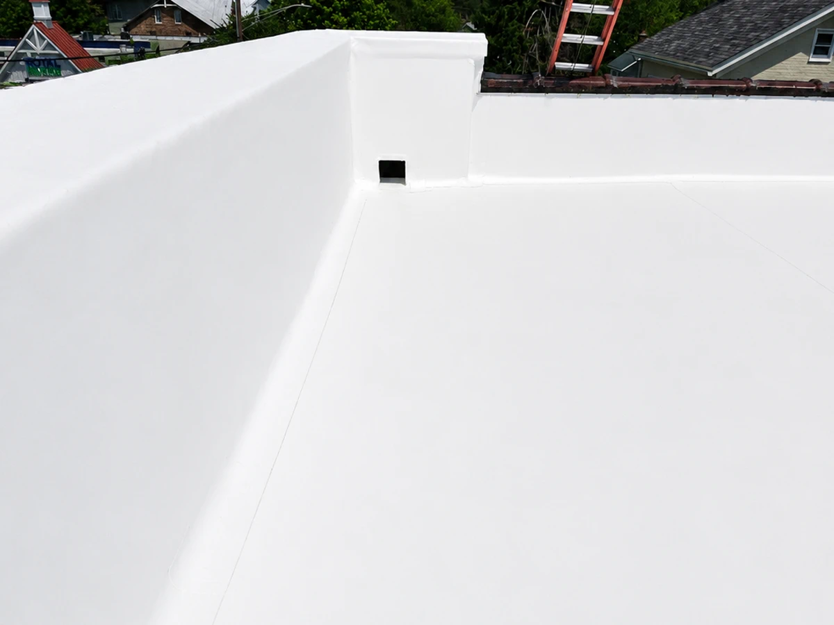 Parapet and scupper corner detail on completed TPO roof installation by ASAP Roofing & Contracting, Baltimore, MD